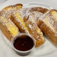 FRENCH TOAST · Fresh baked brioche sliced thick, powdered sugar, butter and syrup.