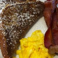 KIDS FRENCH TOAST · Thick brioche slice, powdered sugar, one egg, one strip bacon