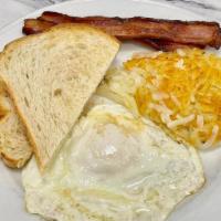 KIDS MINI BREAKFAST · Two strips bacon, 1/2 order hash browns, one egg, one slice toast
