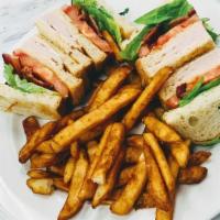 CLUBHOUSE · Triple decker, turkey, bacon, lettuce tomato, mayonnaise, toasted sourdough, French fries.
