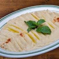 8. Hummus - حمص · Mashed garbanzo beans, tahini, garlic, olive oil and spices