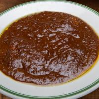 60. Fesenjan - خورشت فسنجان · Stew made with cornish hen, walnuts, pomegranate sauce