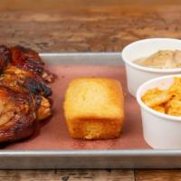 Split Roasted Chicken Plate · Half chicken smoked and basted, served with two sides and cornbread.