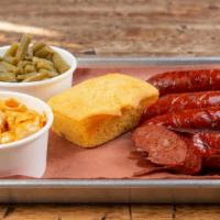 Louisiana Style Hot Link Plate · Louisiana style hot link. Sliced and served with two side dishes and cornbread.