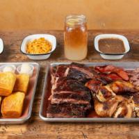 The Meat Packers Platter · Family Platter can serve 5 to 6. A rack of ribs, chopped brisket, pulled pork, whole smoked ...