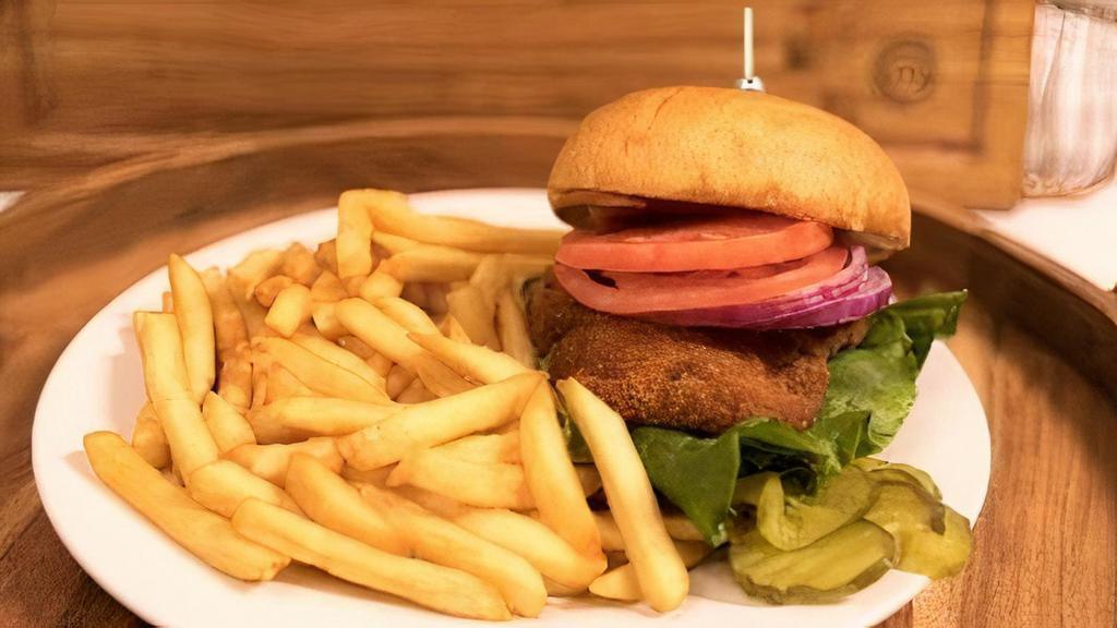 Fried Chicken Burger Meal · Chicken breast fried and served on brioche with French fries.