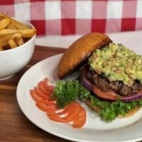 Guacamole Burger Meal · Six oz seasoned angus beef patty on a toasted bun topped with guacamole lettuce tomatoes and...