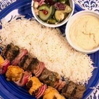 Chicken Kabob 2 Skewer Meal · Served with basmati rice, Greek salad and a side of hummus.