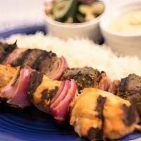 Beef Kabob 2 Skewer Meal · Served with basmati rice, Greek salad and a side of hummus.