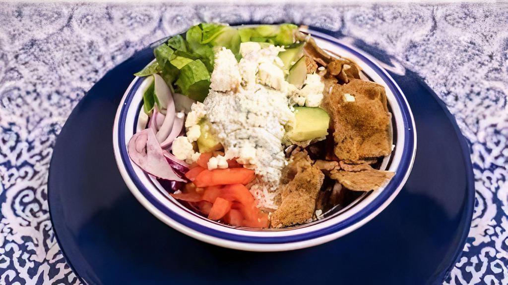 Beef & Lamb Gyro Bowl · Marinated beef/lamb gyro meat served with rice, lettuce, cucumbers, tomatoes, onions, feta and tzatziki.