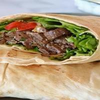 Beef Shawarma Wrap · Beef shawarma served with choice of tahini or garlic sauce.