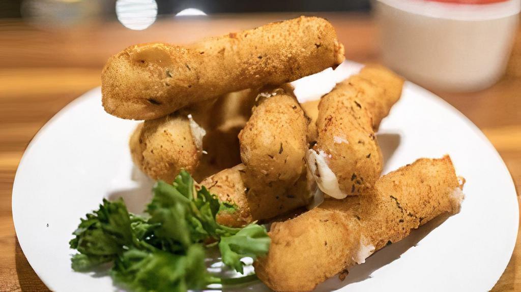 Mozzarella Cheese Sticks · 6 Sticks Served with Red Dipping Sauce.