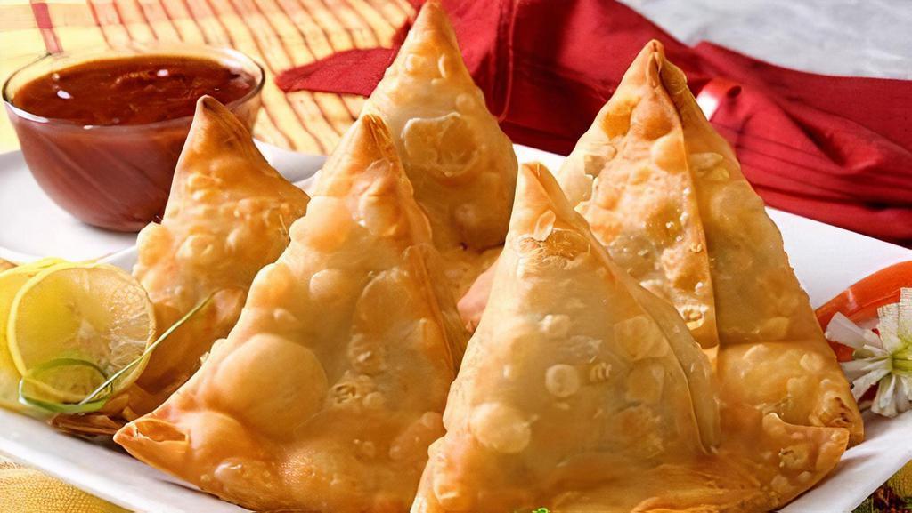 Vegetable Samosa · Pastry with vegetable stuffing with Potato and Green Pea