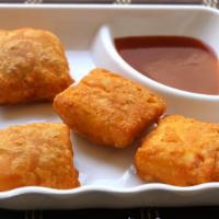 Paneer Pakora · Indian cheese dipped in chick pea batter and deep-fried.