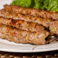 Seekh Kabab · Roasted ground lamb with spices.