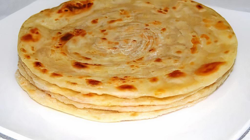 Parantha · Paratha is a delicious flaky layered Indian flatbread