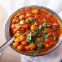 Chana Masala · Garbanzo beans cooked in spices