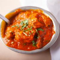 Karahi Lamb · Lamb cooked with onions and bell peppers in a spicy sauce