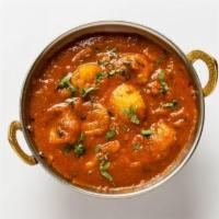 Prawn Vindaloo · Prawns cooked with spicy sauce and potatoes