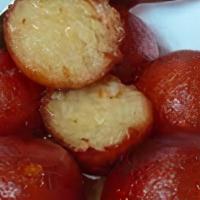 Gulab Jamun · Gulab jamun fried balls of a dough made from milk solids and semolina, soaked with an aromat...