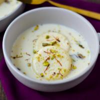Rasmalai · cottage cheese balls soaked in thickened, sweetened milk that has been scented with cardamom...