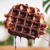 Chocolate glaze · House made chocolate glaze on top of our classic liege waffle