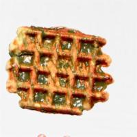 Matcha glaze · Liege waffle with matcha glaze made in house on the side.