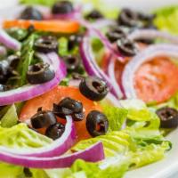 Green Salad · Romaine lettuce, tomatoes, black olives and red onions.