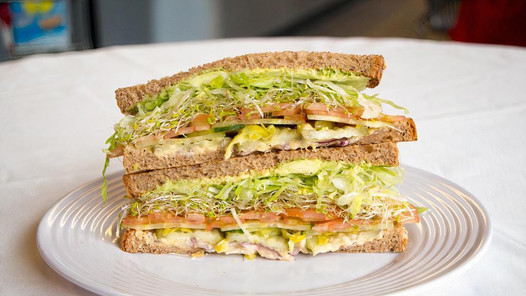 Veggie · Avocado, humus, sprout and cucumber.
Included: mayo, mustard, lettuce tomato, pickle, onion and pepperoncini
Breads: white, wheat,marble rye, 9 grain or sourdough
Rolls: sourdough, wheat, dutch crunch or sweet roll