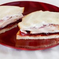 Turkey & Cranberry · Turkey, cream cheese, red onion and cranberry sauce.

Breads: white, wheat,marble rye, 9 gra...