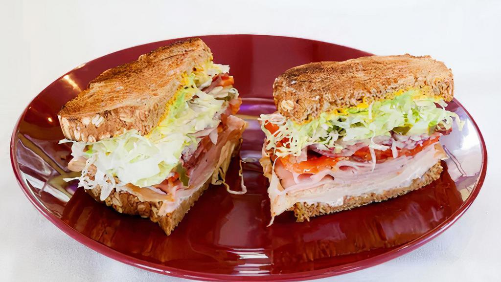 Chicken Breast with Ham · chicken breast, black forest ham, swiss cheese and honey mustard.
Included:  lettuce, tomato, pickle, onion and pepperoncini
Breads: white, wheat, marble rye , 9 grain or sourdough
Rolls: sourdough, wheat, dutch crunch or sweet roll