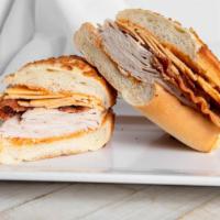 The Mesquite · Mesquite wood smoked turkey, naturally smoked bacon, and chipotle Gouda cheese with fiery ch...