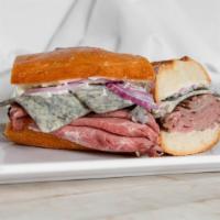 The London Broil · London broil roast beef and Bold Marbleu Moneterey Jack Cheese with red onion and mayonnaise.