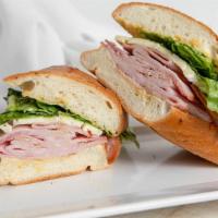The Smokemaster · Smokemaster black forest ham, and French Brie cheese, with romaine lettuce and honey mustard.