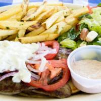 Gyro Plate · Thin slices of seasoned beef served over warm pita, with tzatziki sauce, tomato and red onio...
