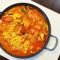 Assorted Meat Stew · spicy stew with sausage, spam, kimchi, tofu, rice cakes, and noodles