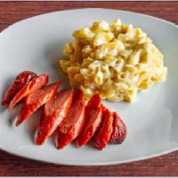 Mac Polish · A single serving of our signature Mac & Cheese topped with Polish Sausage.