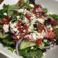 Greek Salad · Feta, tomato, cucumber, olives, chick peas, red onion on bed of romaine.