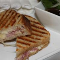 Ham and Brie Panini · Fra' Mani's smoked ham, brie and mustard aioli on sliced sour loaf from Acme Break Company.