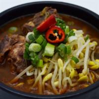 Haejanggug (해장국) · Soybean paste soup cooked with meat and veggie.