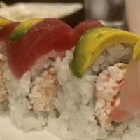 Rainbow · California roll topped w/ a variety of fish.