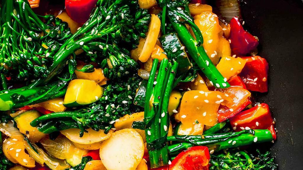 Vegan Ginger Stir Fry · Gluten free, vegan friendly. Your choice of tofu or vegetables stir fried with ginger, garlic, onions, and herbs. Add fried eggs at an upcharge.