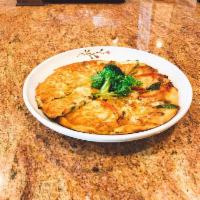 Seafood Pancake (해물파전) · Pan fried shrimp, scallop, calamari, mussels and scallions.