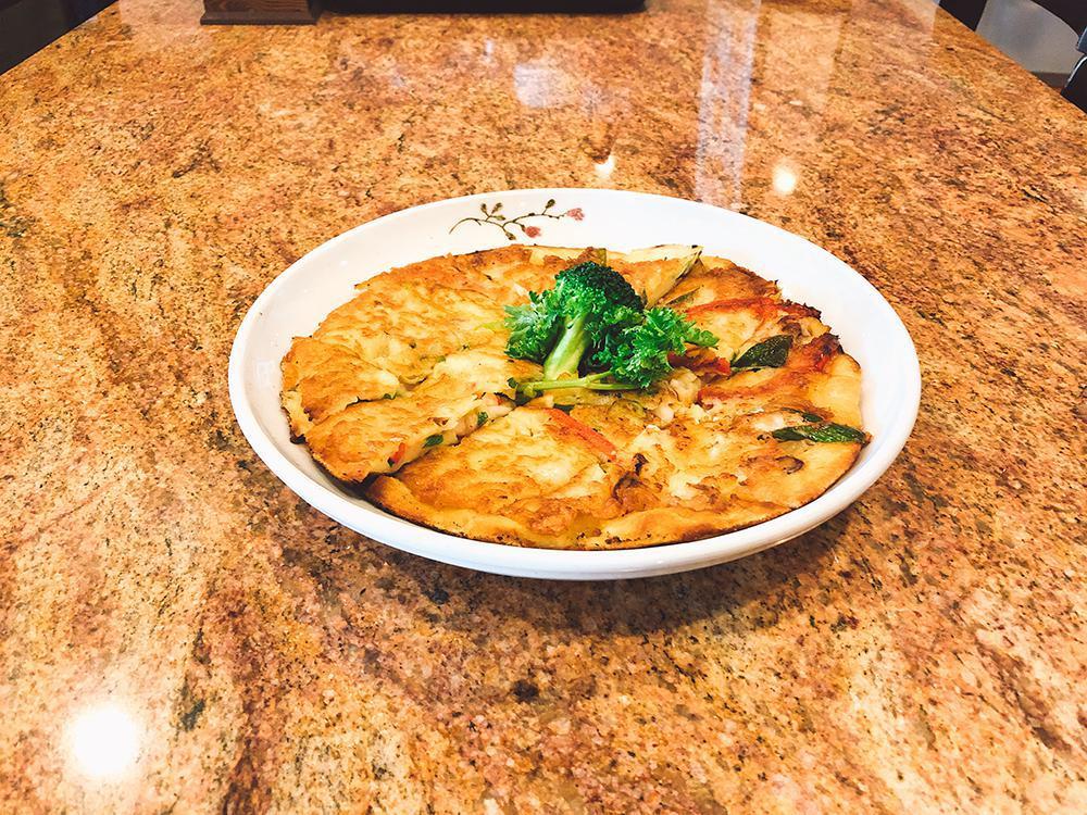 Seafood Pancake (해물파전) · Pan fried shrimp, scallop, calamari, mussels and scallions.