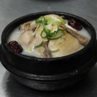 Ginseng Young Chicken Soup (영계삼계탕) · Whole young chicken stuffed with ginseng, jujubes, chestnuts, sticky rice and garlic.