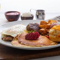 The Ella’s Plate · Two eggs, two buttermilk pancakes, chicken hash, country potatoes, with your choice of count...