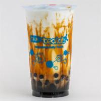 MilkTiger · Brown sugar non-cafferinated milk tea with boba pearls.