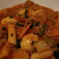 31. Spicy Rice Cake · Stir-fried rice cake and fishcake in a sweet and spicy sauce.