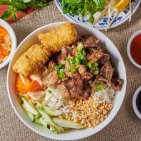 B3. Bun Thit Nuong Cha Gio · Grilled pork and fried egg roll with vermicelli.