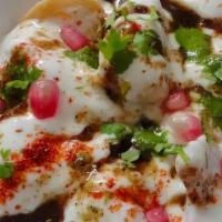 Dahi Bhalla  Chaat- gluten free- New ! · One of the yummiest starter!! Lentil dumplings topped with a spicy savory yogurt and tamarin...